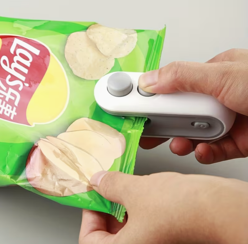 Portable Manual Sealing Machine – USB Rechargeable Handheld Bag Sealer (1pc)